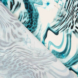 Crêpe léger bleu à imprimé animalier floral - Ribes y Casals