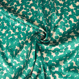 Satin polyester imprimé feuilles émeraude - Ribes y Casals
