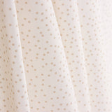 Popeline de coton à pois beiges sur fond blanc - Ribes y Casals