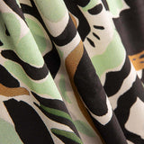 Viscose crêpé Dessin de fleurs vertes - Ribes y Casals