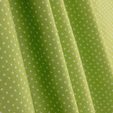 Percal imprimé à pois blancs sur fond pistache - Ribes y Casals
