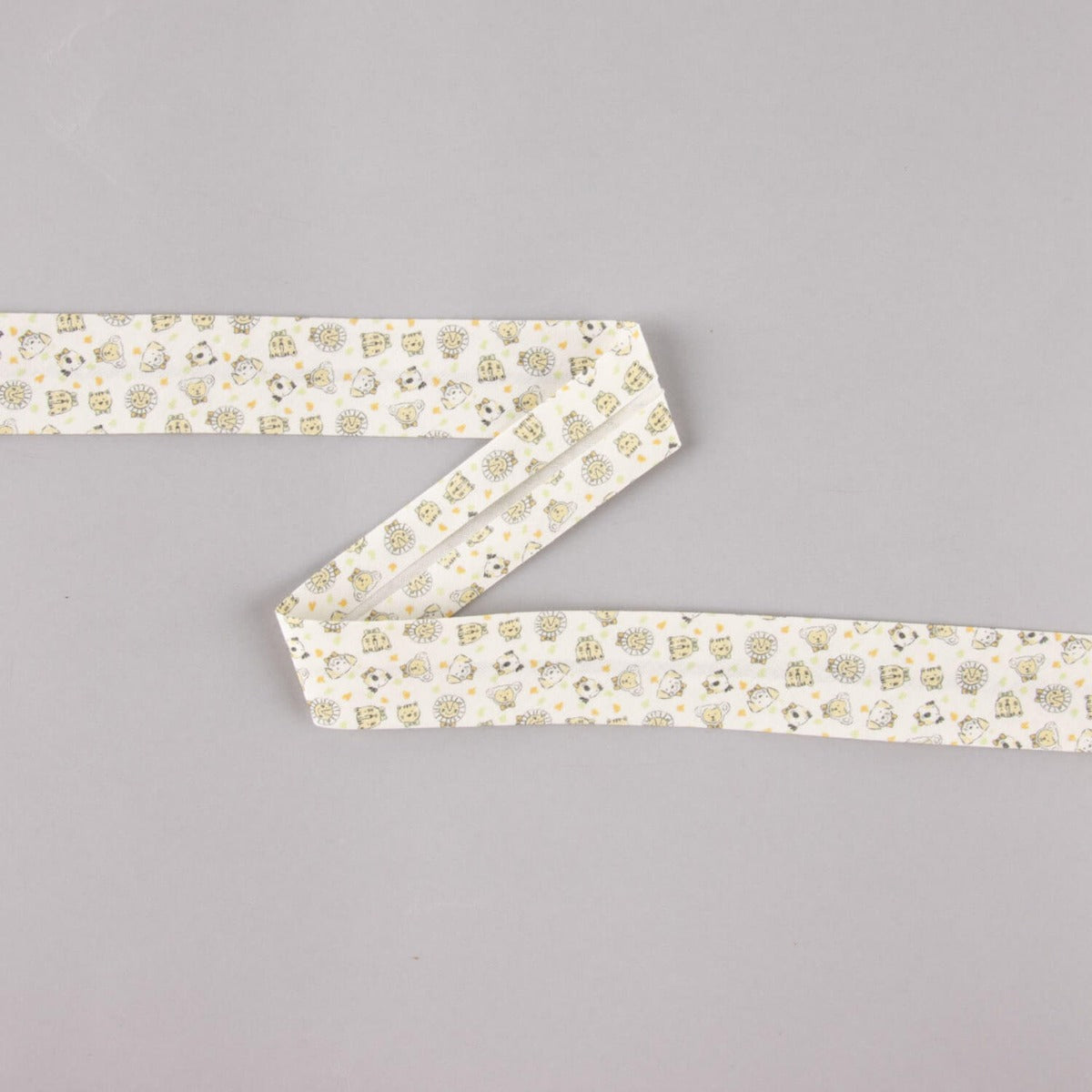 Biais en coton biologique zoo orange-vert 18 mm - Ribes y Casals