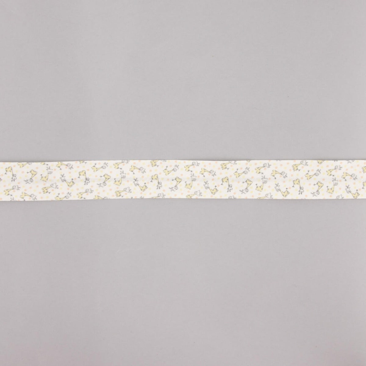 Biais en coton biologique girafes orange-crème 18 mm - Ribes y Casals