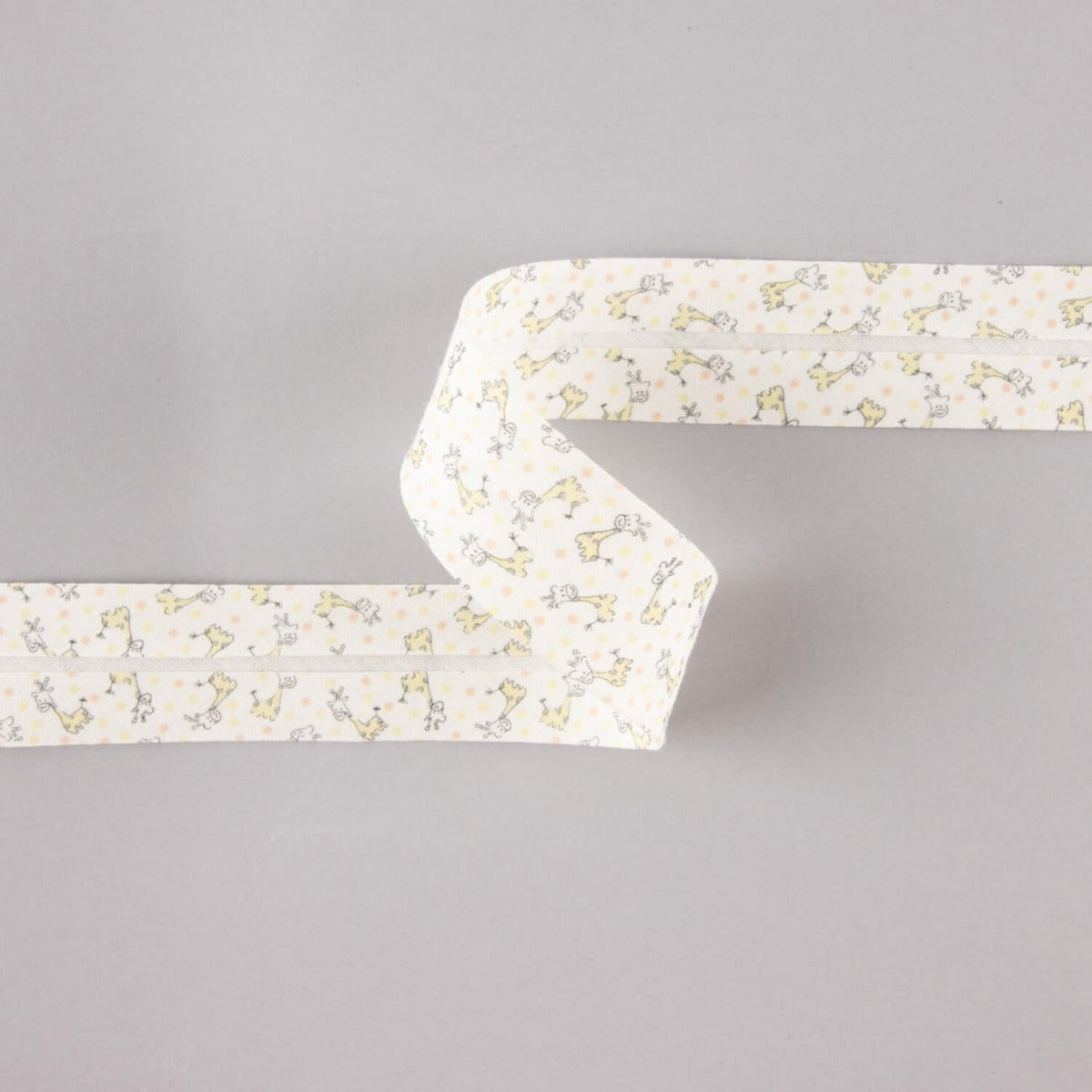 Biais en coton biologique girafes orange-crème 18 mm - Ribes y Casals