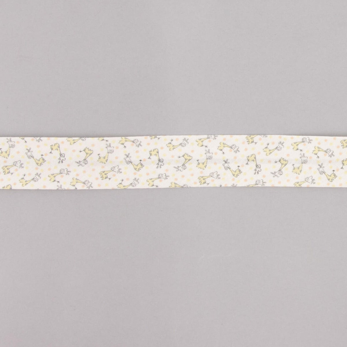 Biais en coton biologique Girafes orange-crème 30 mm - Ribes y Casals