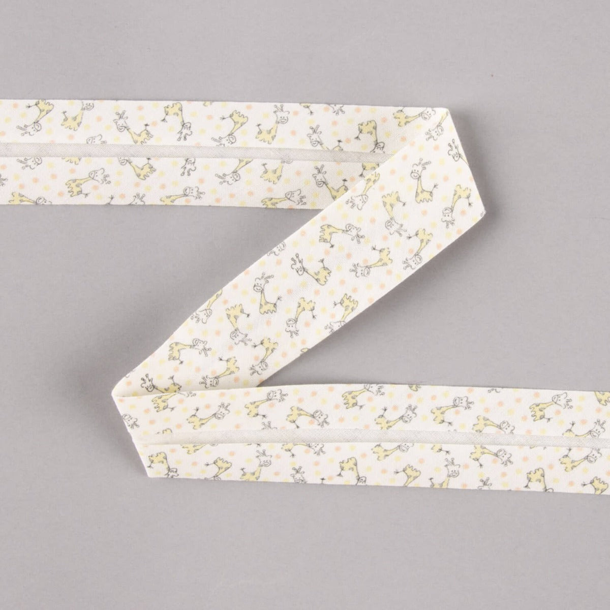 Biais en coton biologique Girafes orange-crème 30 mm - Ribes y Casals