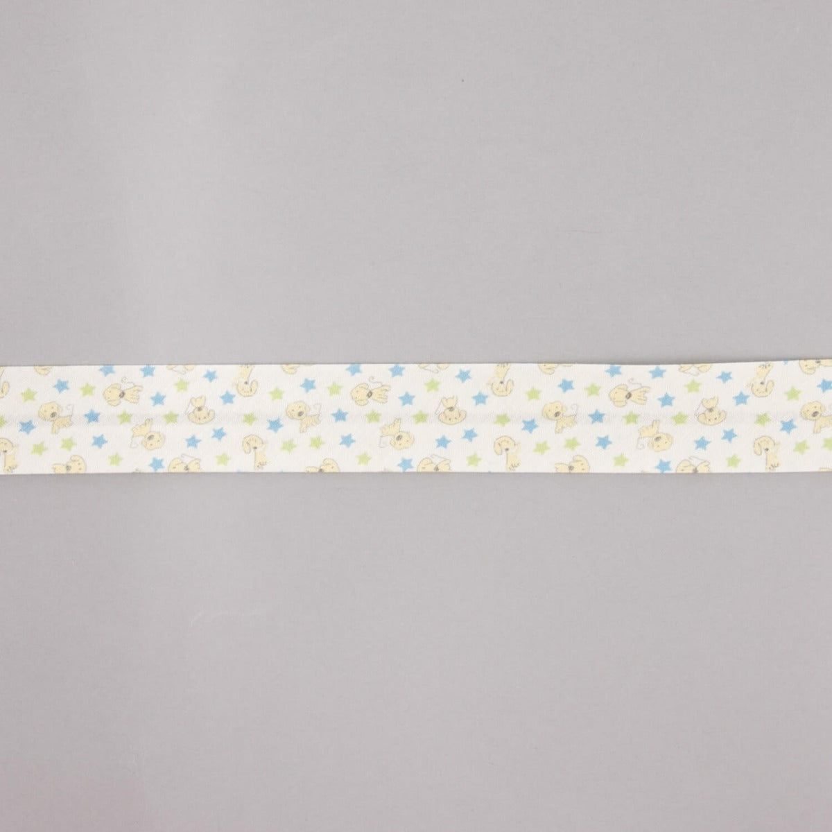 Biais en coton biologique étoiles de chiots bleu-vert 18 mm - Ribes y Casals