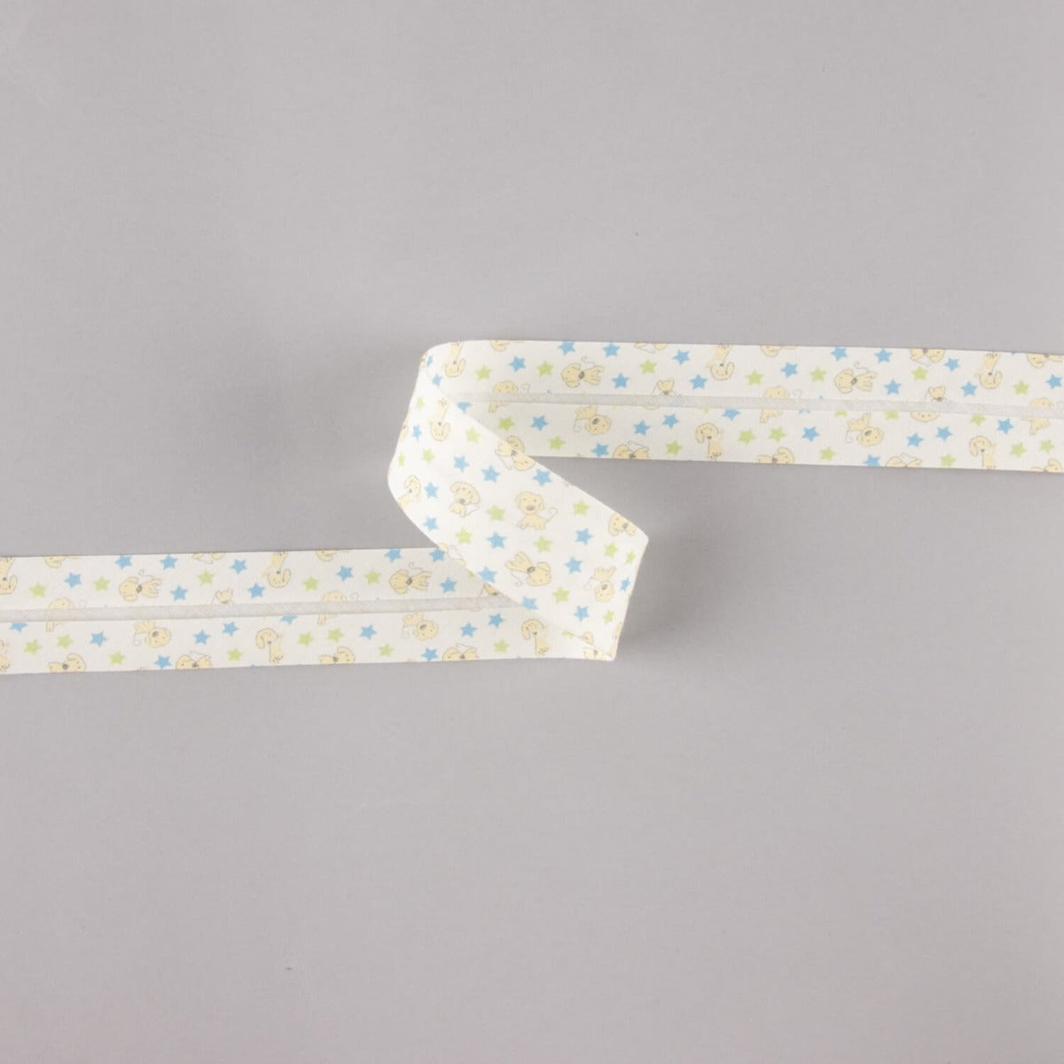 Biais en coton biologique étoiles de chiots bleu-vert 18 mm - Ribes y Casals