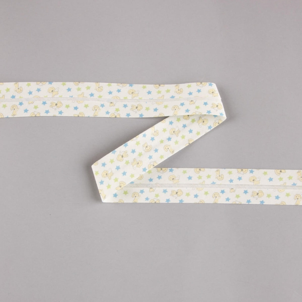 Biais en coton biologique étoiles de chiots bleu-vert 18 mm - Ribes y Casals