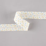 Biais en coton biologique chiots étoiles bleu-vert 30 mm - Ribes y Casals