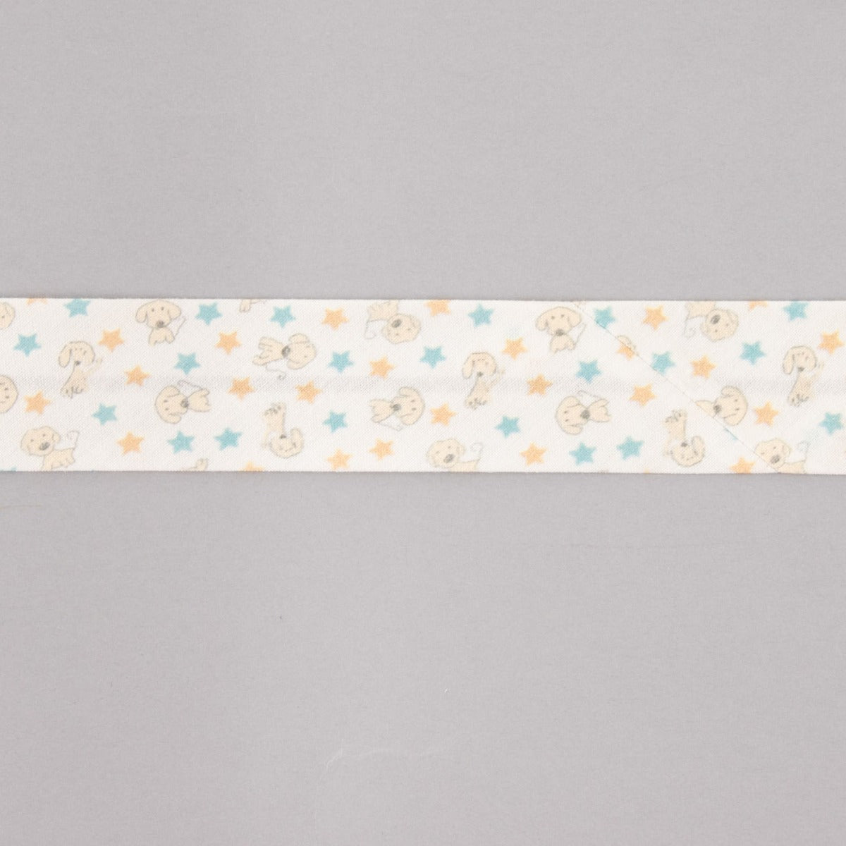 Biais en coton biologique chiots étoiles bleu-orange 30 mm - Ribes y Casals