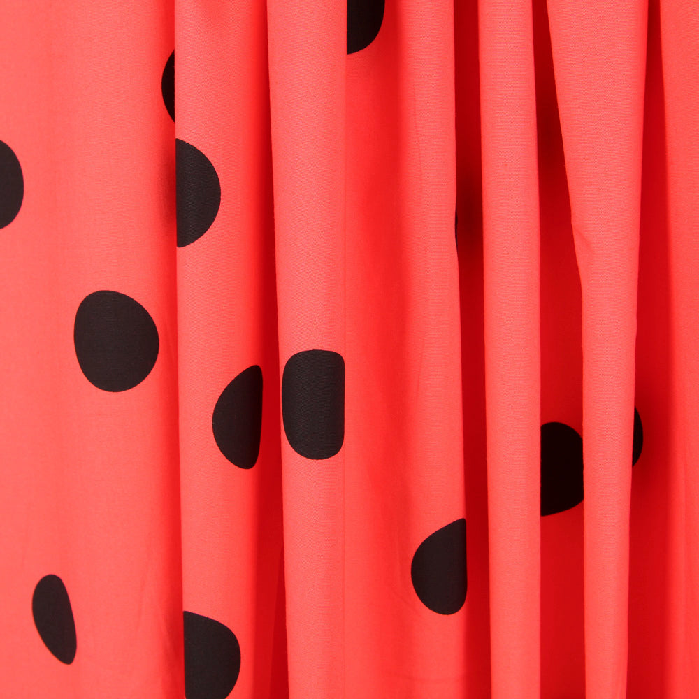 Popeline Spandex Noir Pois 30mm Corail - Ribes y Casals