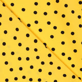 Retal Crepe Lunares Negro 7mm Amarillo 120x145 cm - Ribes y Casals