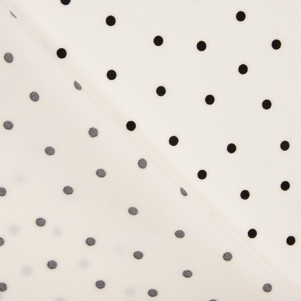 Trench-coat élastique à pois blancs - Ribes y Casals