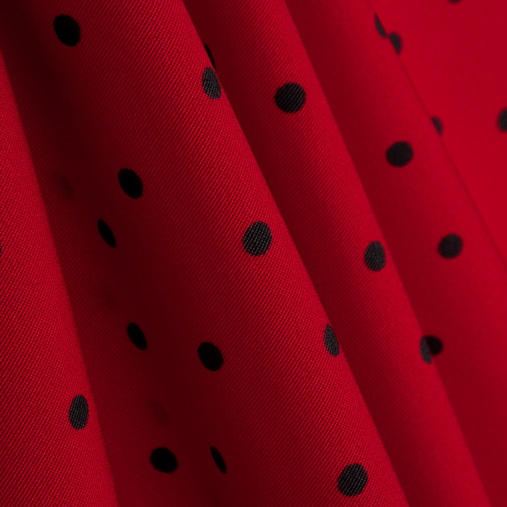 Trench-coat élastique à pois rouges - Ribes y Casals