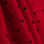 Trench-coat élastique à pois rouges - Ribes y Casals