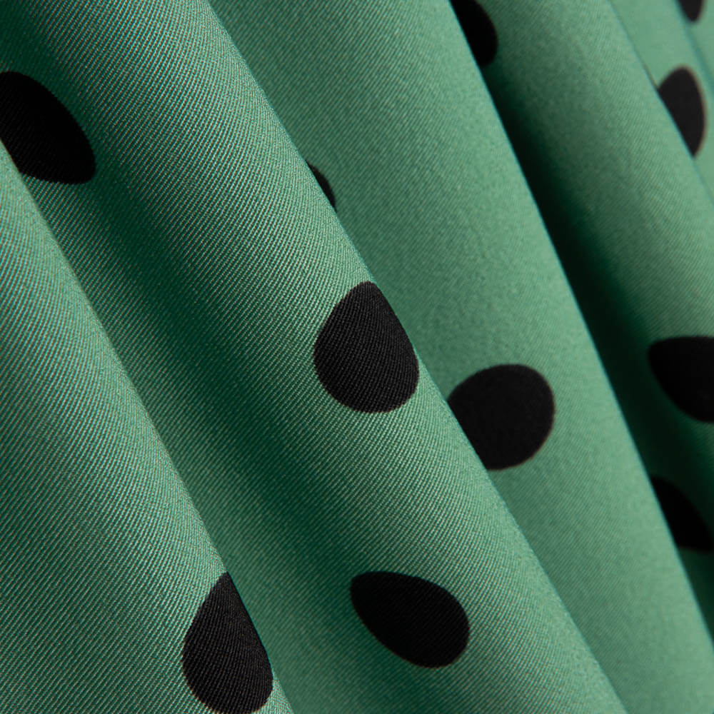 Trench-coat élastique à pois vert sauge - Ribes y Casals