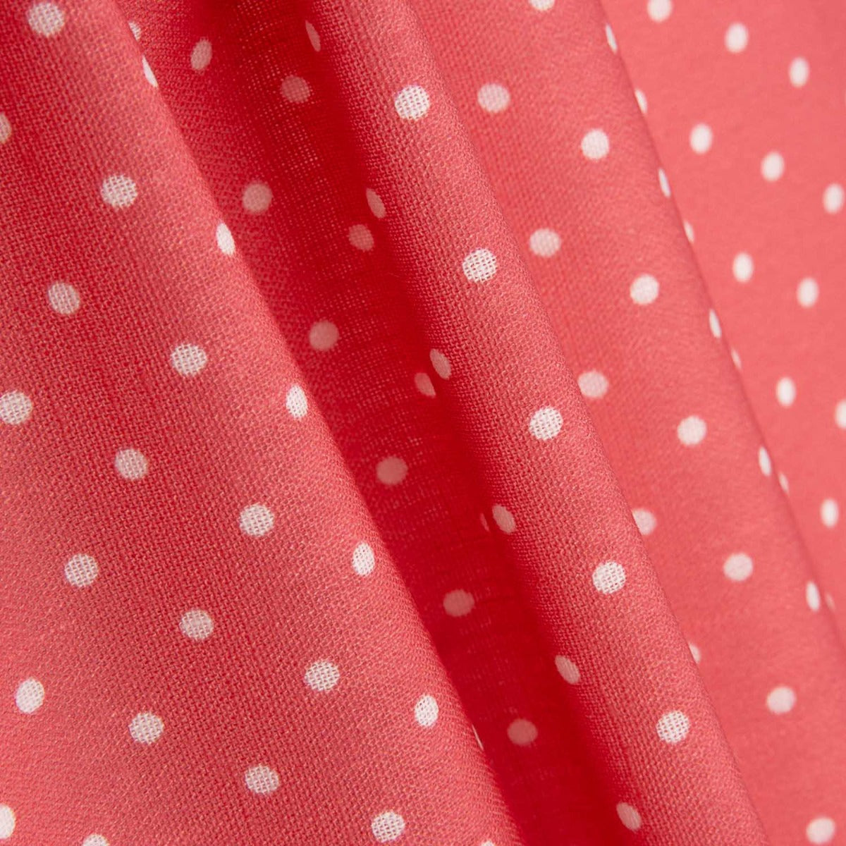 Tissu à imprimé rustique à pois 3mm en corail - Ribes y Casals