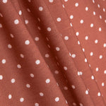 Tissu imprimé rustique à pois 3mm en orange brûlé - Ribes y Casals