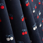 Velours milleraies en tissu de coton imprimé cerises bleu marine - Ribes y Casals