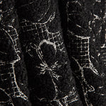 Bouclé brodé de motifs floraux Noctis Noir - Ribes y Casals