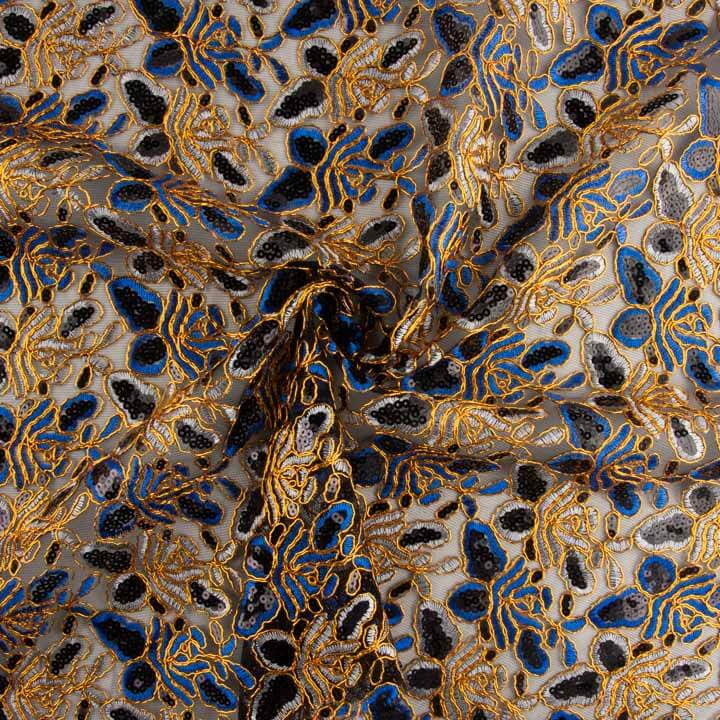 Broderie « Rebrodé » avec tissu à sequins Alhambra bleus - Ribes y Casals