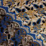 Broderie « Rebrodé » avec tissu à sequins Alhambra bleus - Ribes y Casals
