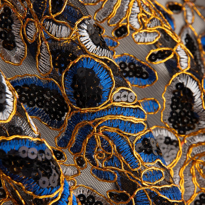 Broderie « Rebrodé » avec tissu à sequins Alhambra bleus - Ribes y Casals