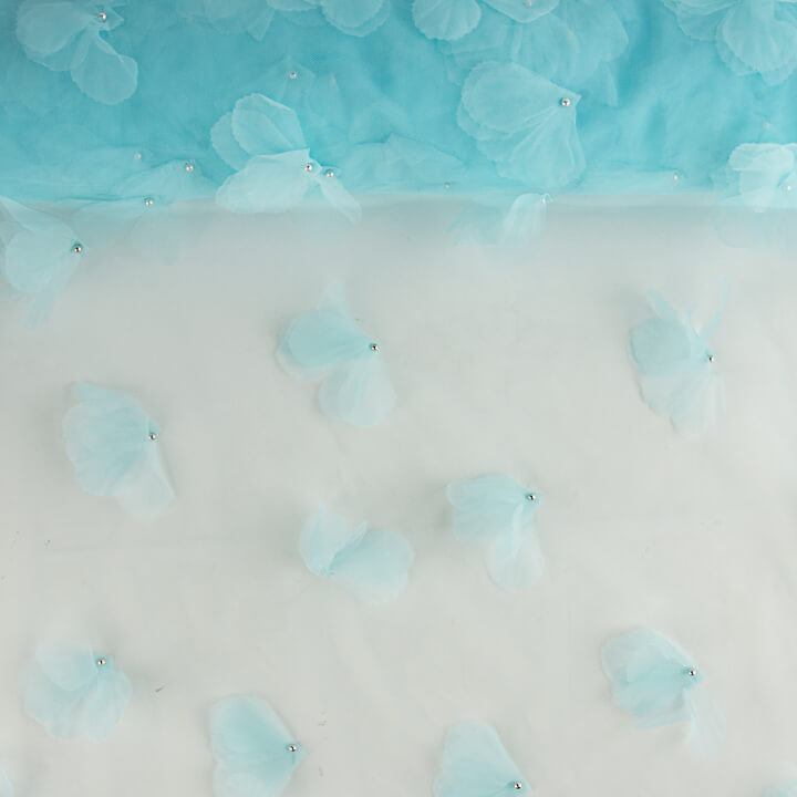 Tulle bleu turquoise fleuri en 3D et avec des perles - Ribes y Casals