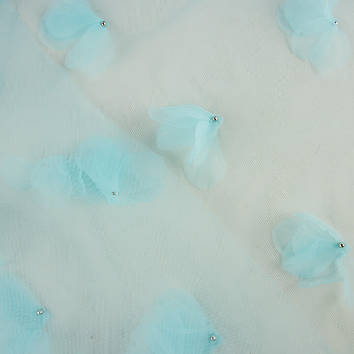 Tulle bleu turquoise fleuri en 3D et avec des perles - Ribes y Casals