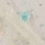 Tulle « Jardin de papillons » avec fleurs en 3D et lamé argenté - Ribes y Casals