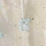 Tulle « Jardin de papillons » avec fleurs en 3D et lamé argenté - Ribes y Casals
