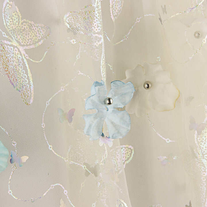 Tulle « Jardin de papillons » avec fleurs en 3D et lamé argenté - Ribes y Casals