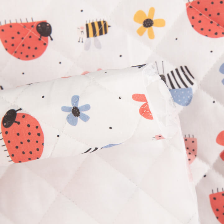 Coussin matelassé réversible « Petit Jardin » et « Vichy rose » - Ribes y Casals