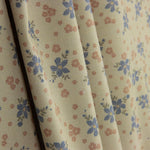 Percale imprimée de petites fleurs bleues et roses - Ribes y Casals