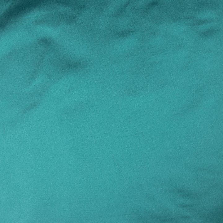Satin Mikado réversible « Tornasol » bleu turquoise et marron - Ribes y Casals