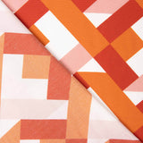 Viscose imprimée de motifs géométriques orange et corail - Ribes y Casals