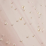Tulle rose nude avec des perles nacrées - Ribes y Casals