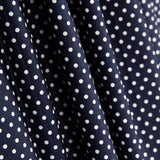 Popeline de coton à pois bleu marine - Ribes y Casals