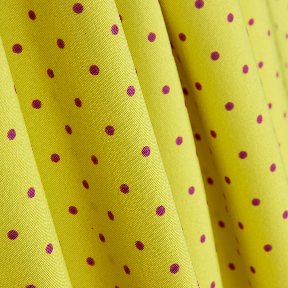 Gabardine extensible à pois 3 mm citron vert-bougainvillier - Ribes y Casals