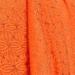 Lycra Paillettes Fleurs Orange Fluo - Ribes y Casals