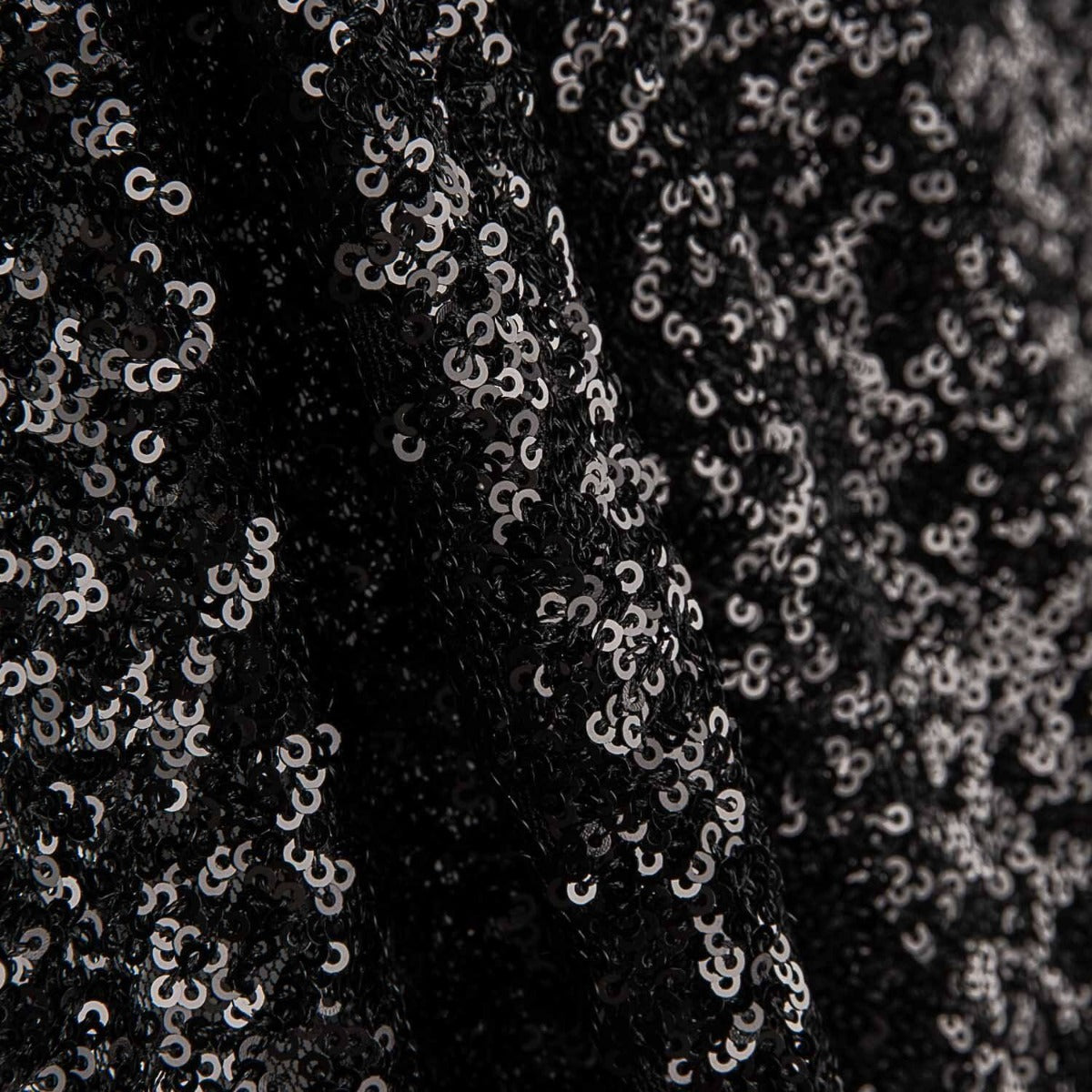 Tissu Lycra à paillettes noir sur tulle élastique - Ribes y Casals