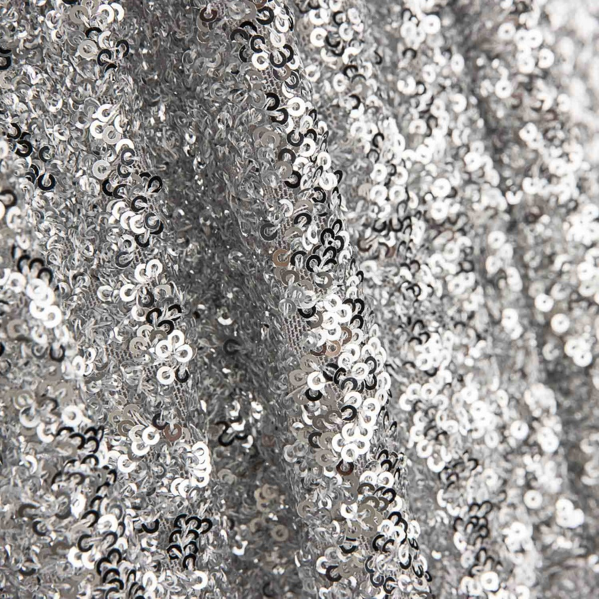 Tissu Lycra à paillettes argent sur tulle élastique - Ribes y Casals