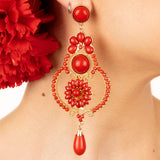 Boucles d&#39;oreilles flamenco avec fleur, anneau, résine rouge et accents dorés - Ribes y Casals