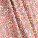 Percale imprimée « Jardin sauvage » corail - Ribes y Casals