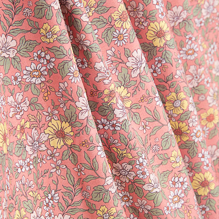 Percale imprimée « Jardin sauvage » corail - Ribes y Casals