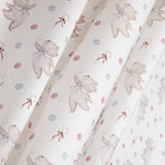 Percale imprimée « Petits ours volants » rose et bleu - Ribes y Casals