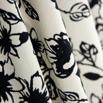 Piqué Polyester Fleurs Noir - Ribes y Casals