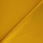 Tricot crêpe néoprène moutarde - Ribes y Casals