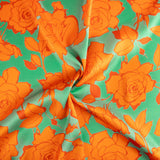 Satin imprimé fleur de Caipi orange - Ribes y Casals